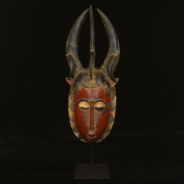 African Yaure Mask on display stand