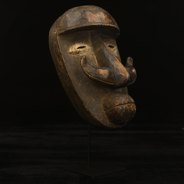 African Bete mask on display stand Right Angle