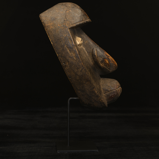 African Bete mask on display stand Right Side