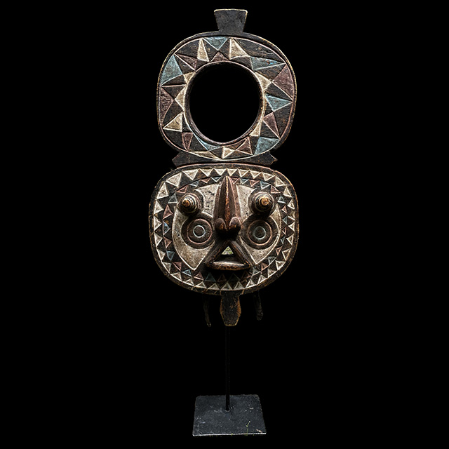 African Bobo mask on display stand