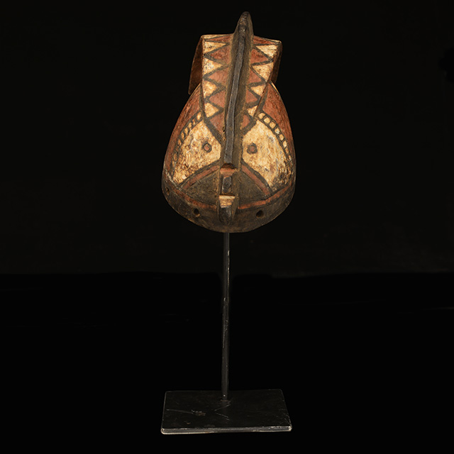 African Bobo mask on display stand