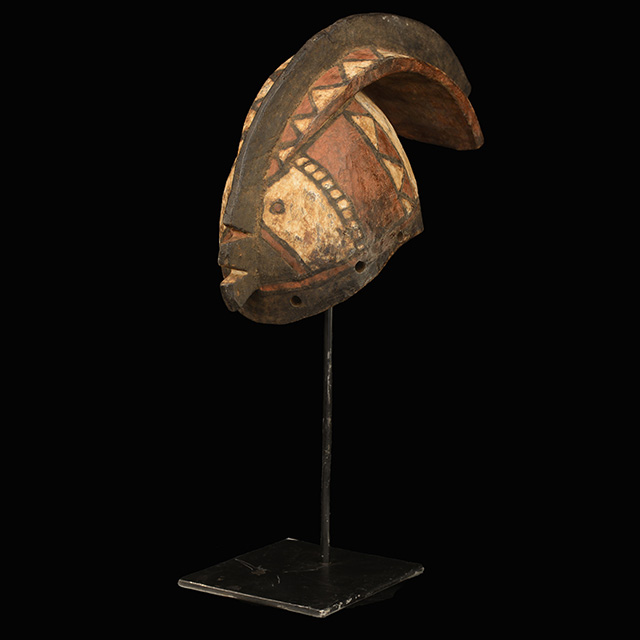 African Bobo mask on display stand Left Angle