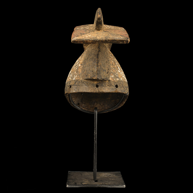 African Bobo mask on display stand