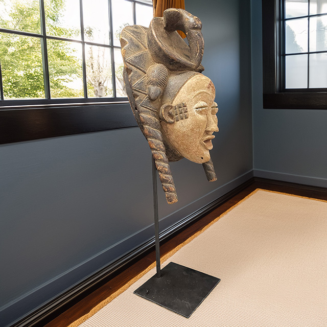 African Punu mask on display stand 46