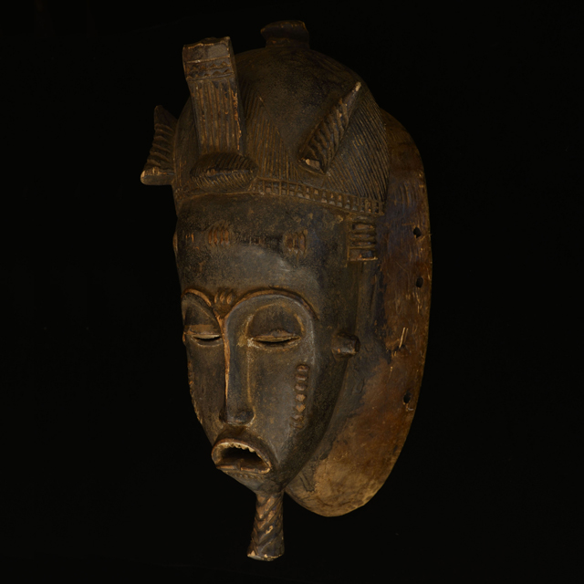 African mask from the yaure tribe of Ivory Coast Left Angle