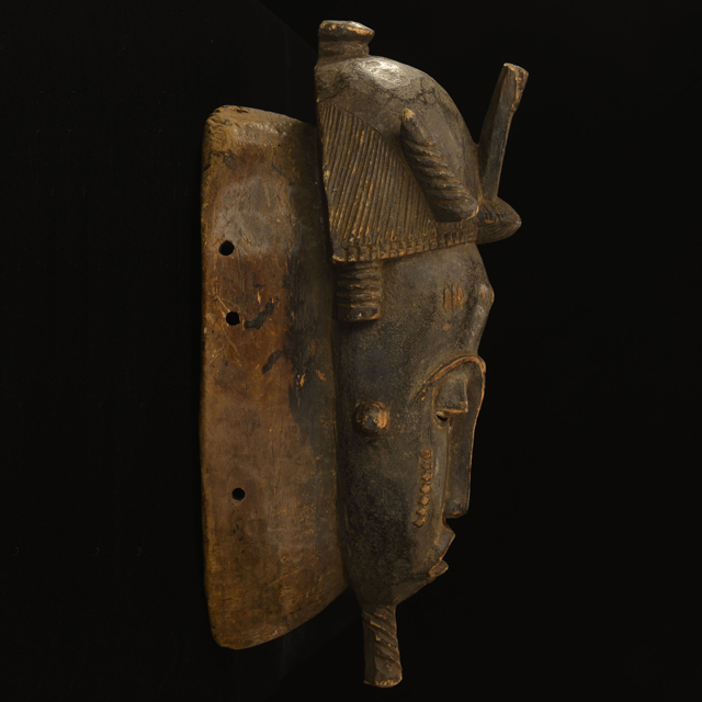 African mask from the yaure tribe of Ivory Coast Right Side